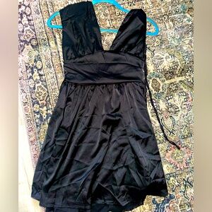 NWT romper, satin silky material with adjustable back tie.